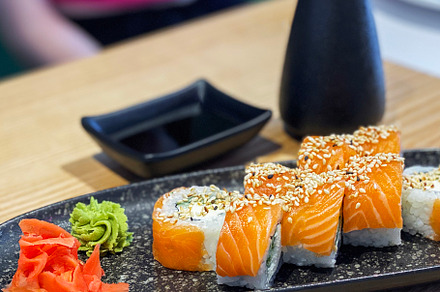 Eating roll sushi, a Food & Drink Photo by Olena Rudo