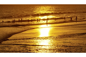People swimming Bali beach at golden, a Person Photo by Goinyk