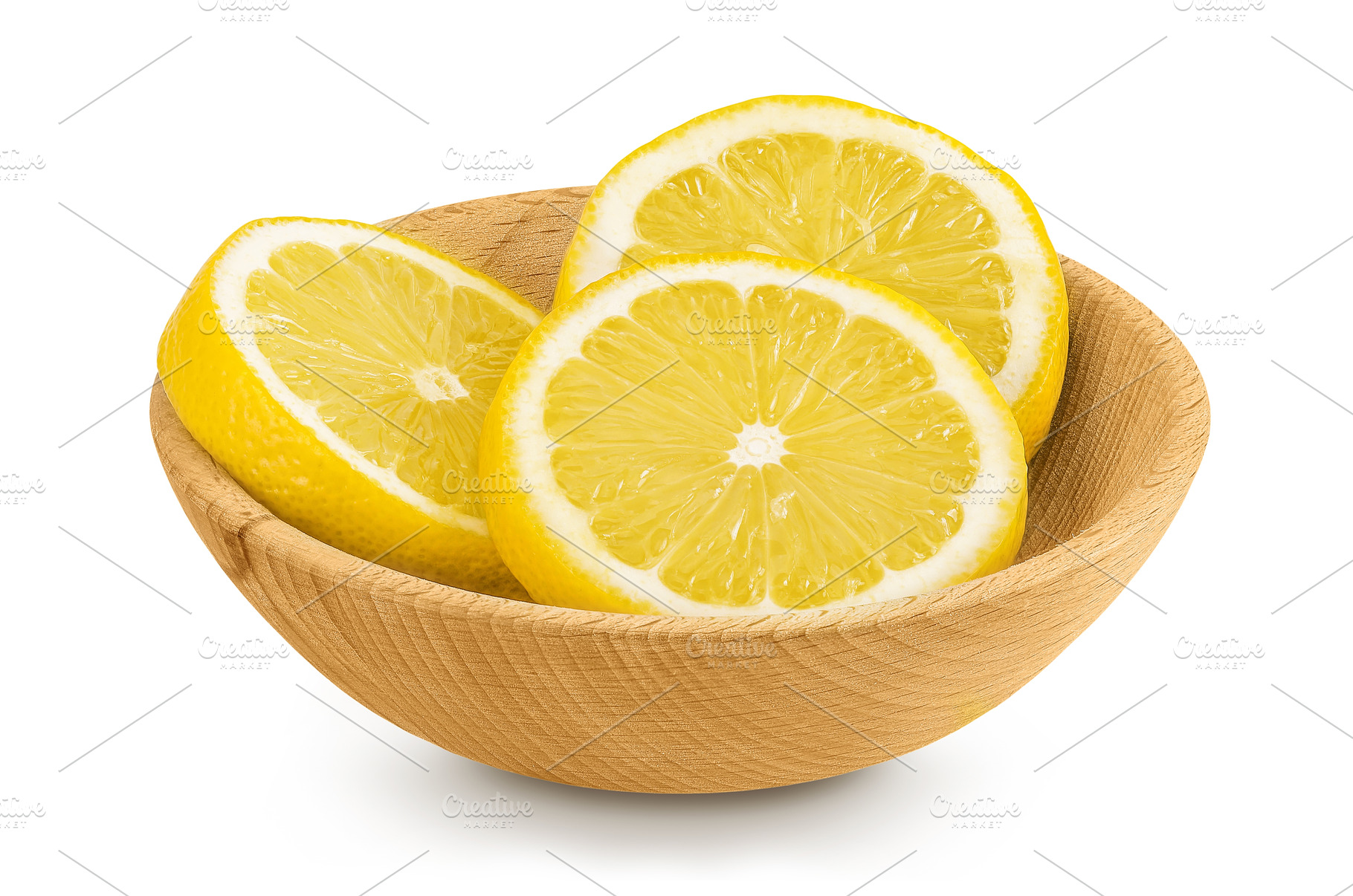 Ripe lemon slices in wooden bowl, a Food & Drink Photo by NataPhoto