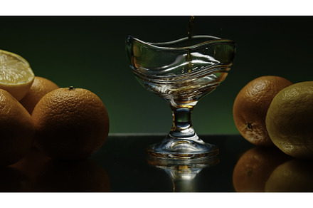 A glass with alcoholic cocktail, a Person Photo by Media Whale Stock