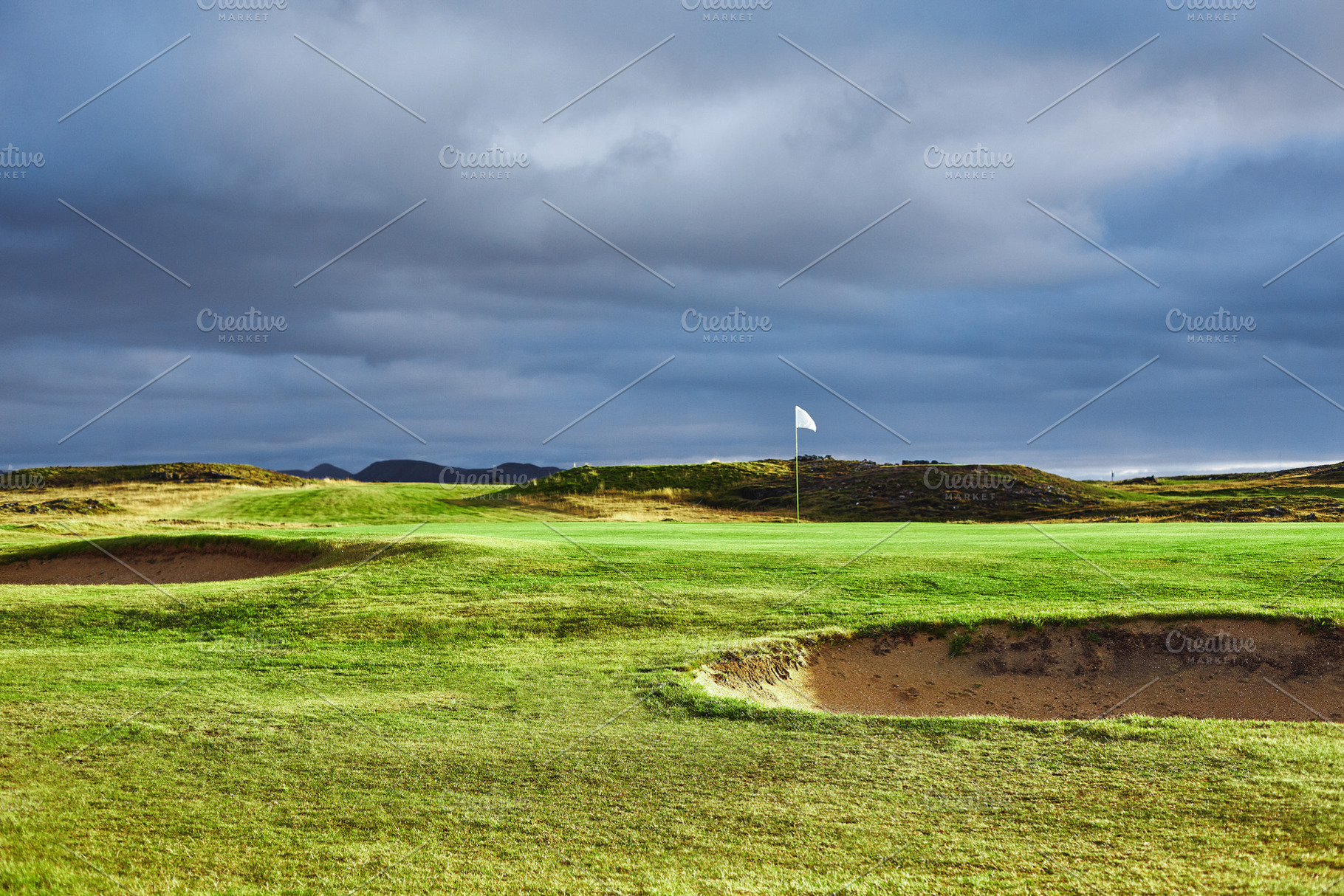 Landscape view of golf course in iceland stock photo containing golf and field, a Nature Photo by vitaliymateha photography