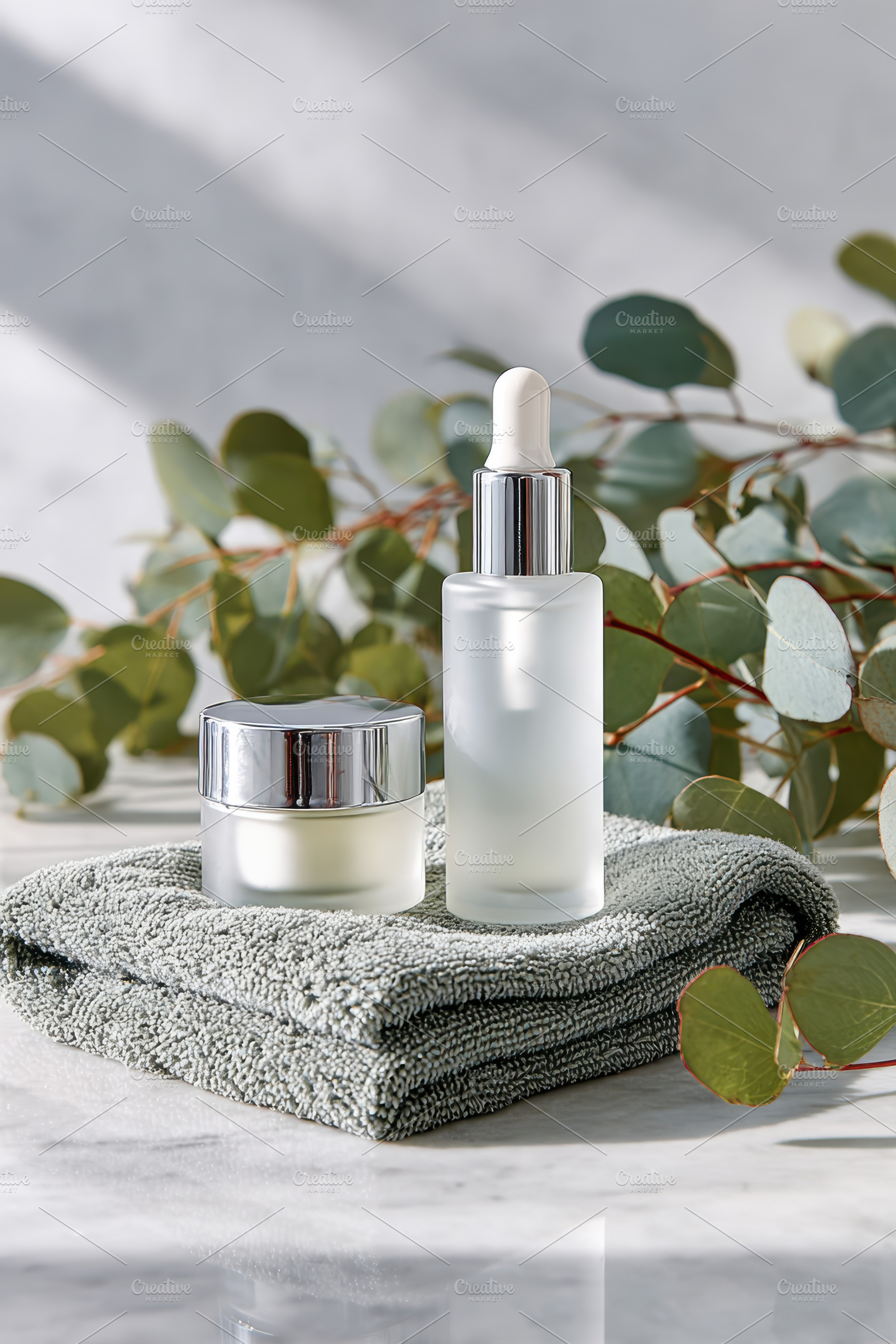 Skincare products with eucalyptus and towels, a Beauty & Fashion Photo by AlyaAnd