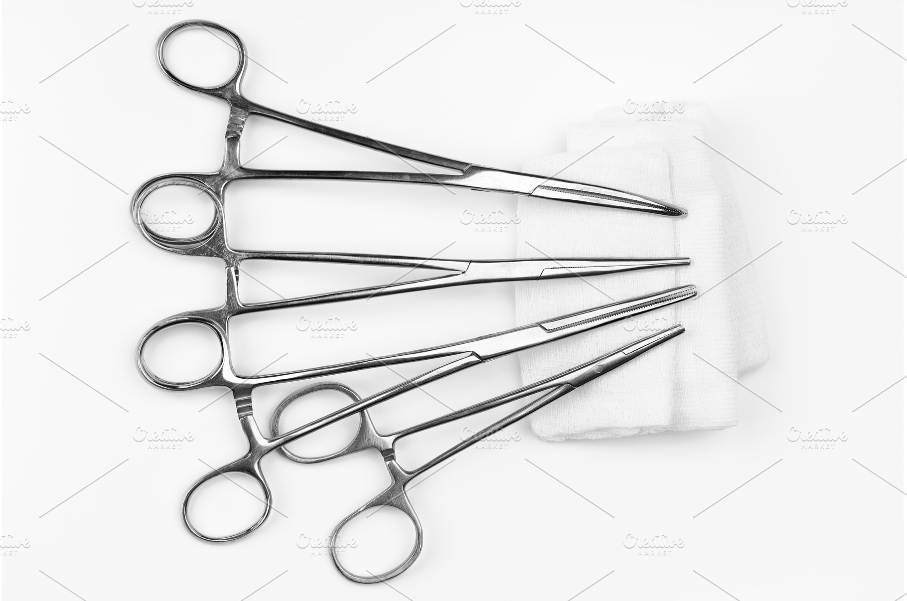 Surgical needle drivers lying on, a Health & Medical Photo by Alexander-Piragis