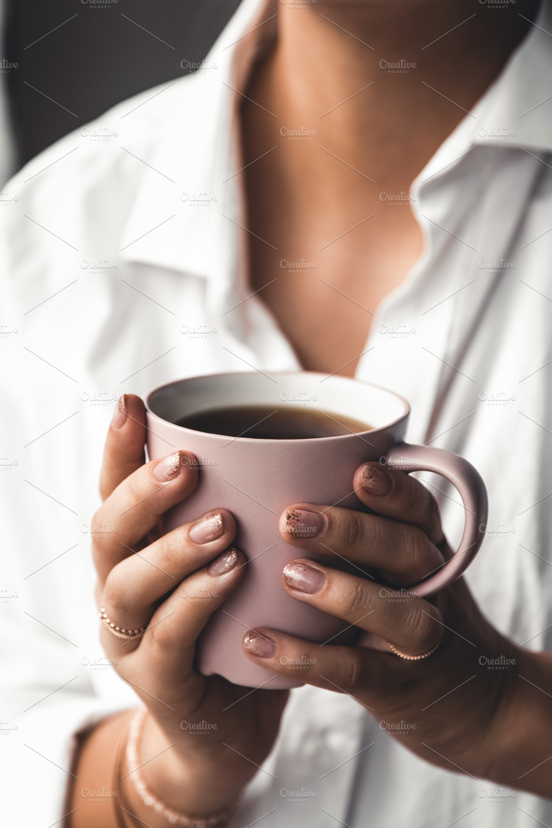 Woman holds morning coffee featuring woman, business, and design, a Beauty & Fashion Photo by OS