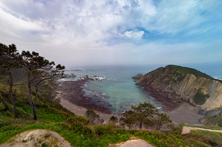 Aerial view of the coastline and cliffs at Silencio Beach in Asturias, Spain., a Nature Photo by CreativePhotoSpain