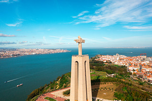 Sanctuary of Christ the King statue with city Almada and Tagus River, a Photo by andreonegin market