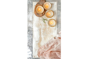 Warm rustic candle arrangement on, a Background Photo by Lermont51