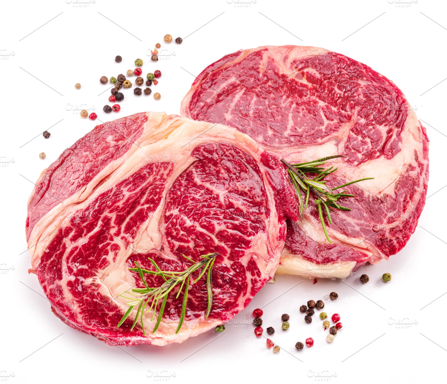 Raw beef steak on a white, a Food & Drink Photo by Volff