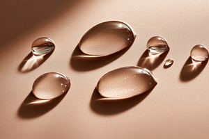 Water Droplets on a Smooth Beige Surface, an Abstract Photo by Natalia Klenova's Shop