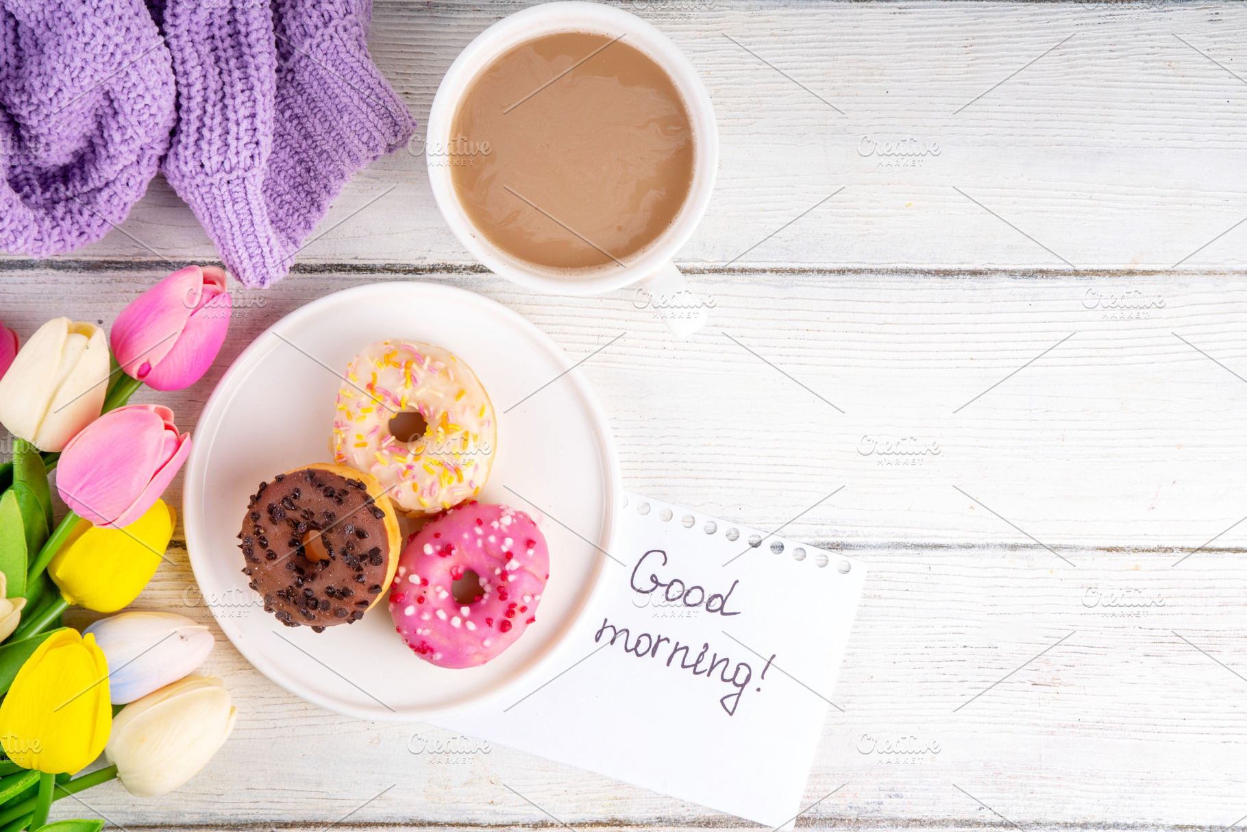 Small sugar glazed donuts with coffee latte cup, tulip flowers,, a Holiday Photo by Rimma