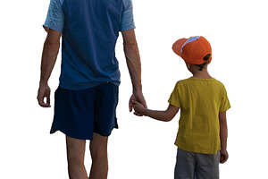 Back view isolated image of a father and boy walking, a Person Photo by DanFLCreativo