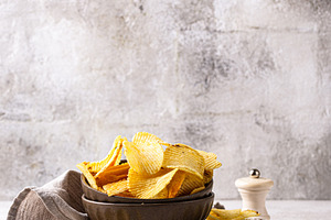 Crispy fresh potato chips, junk food, a Food & Drink Photo by Yulia Furman