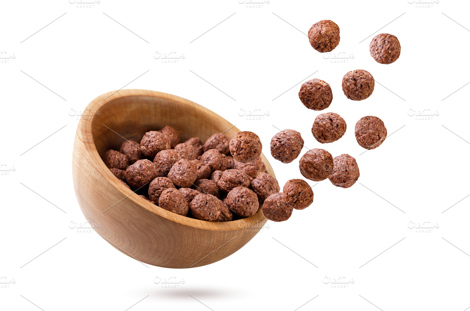 Chocolate corn balls fly out of a, a Food & Drink Photo by innakreativ