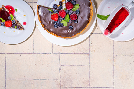 Homemade cheesecake with chocolate and berry, a Food & Drink Photo by Rimma