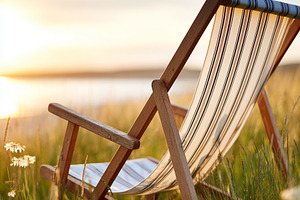 Wooden deck chair on a seaside, a Nature Photo by MistyDay