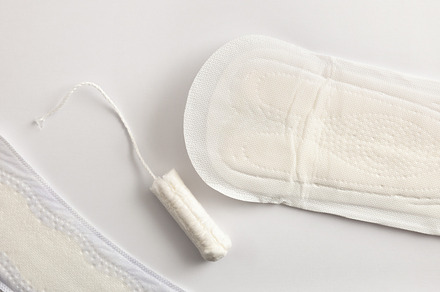 Background with female absorbent protectors for menstrual cycle, a Health & Medical Photo by Davizro's Market