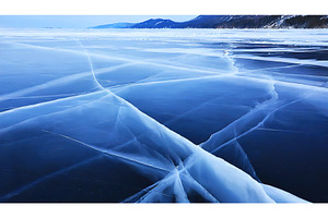 An expansive view of a frozen lake, a Nature Photo by Igor Tichonow