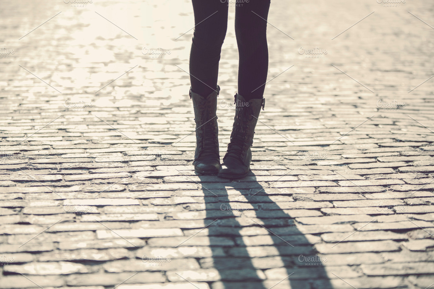 Woman's Boots on Stone