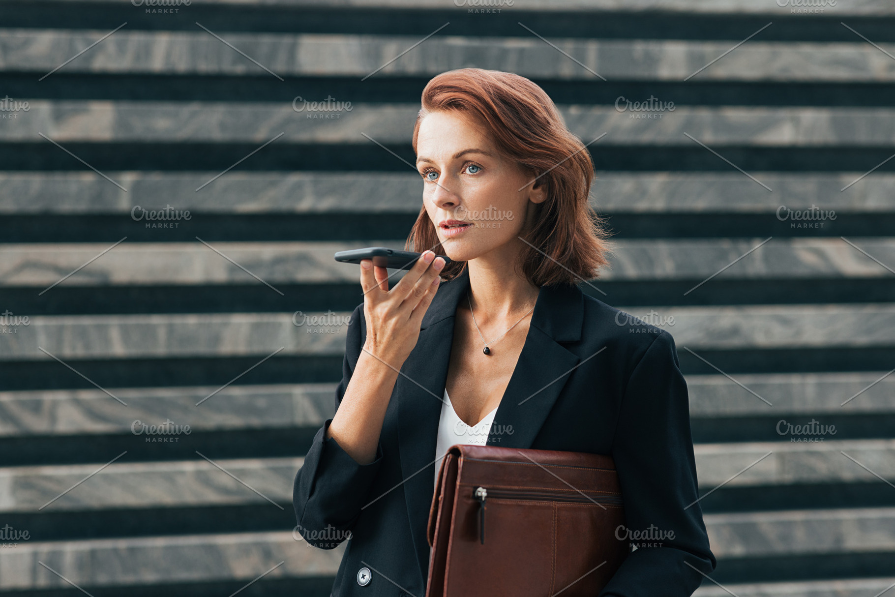 Confident business woman recording, a Person Photo by Artem Varnitsin