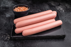 Four raw pink hot dog sausages (frankfurters/wieners) on a contr, a Food & Drink Photo by composter-box@mail.ru
