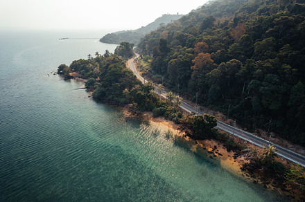 Aerial view  road along the sea,Seaside road approaching a beach, a Nature Photo by Art Rachen