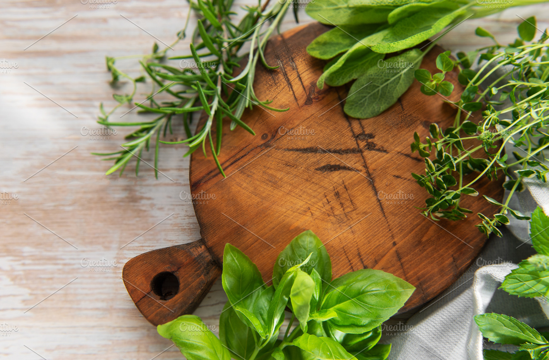 Fresh cooking herbs on wooden board preparing ingredients, a Food & Drink Photo by Olena Rudo