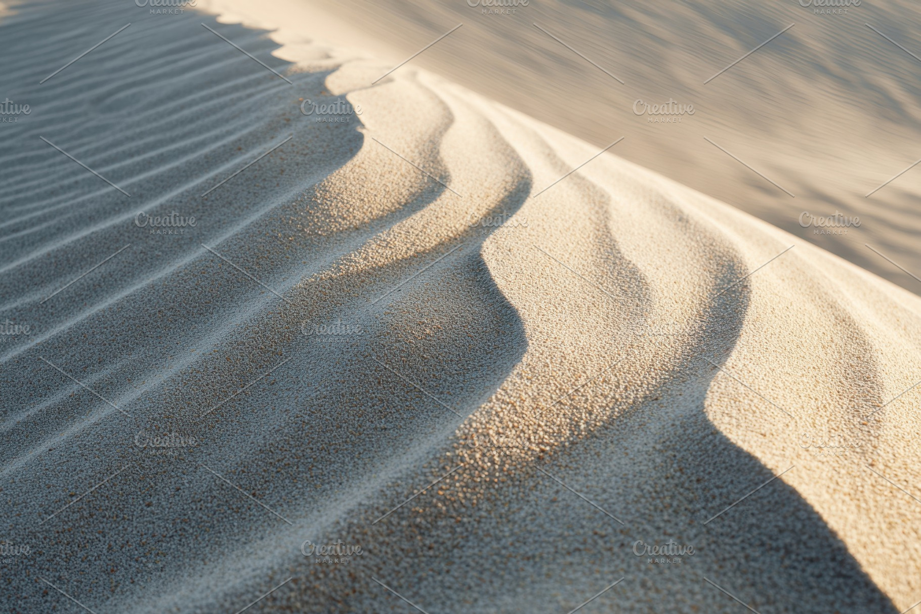 Soft shadows on sand dunes in desert landscape, a Wallpaper Photo by AlyaAnd