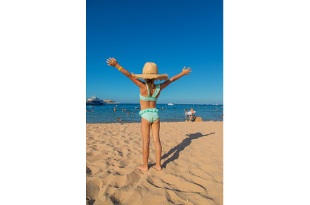 A child at the sea is a girl, a Person Photo by yanadjana