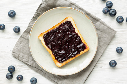 Healthy Blueberry Jelly and Toast on a Plate, top view., a Food & Drink Photo by LiudmylaChuhunova