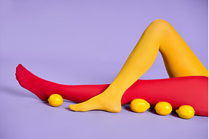Long slim woman legs in multicolor, a Beauty & Fashion Photo by Gladkov photography