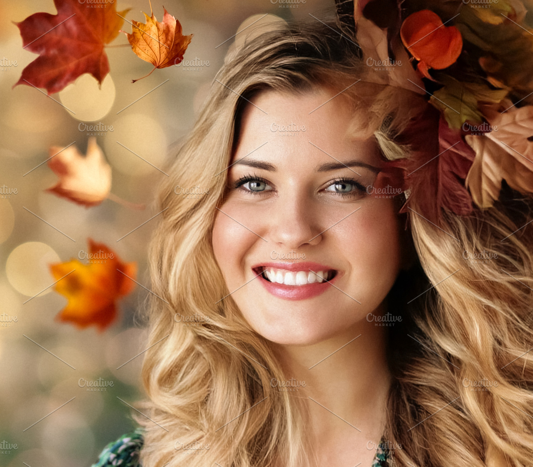 Smiling young woman enjoying autumn season, colorful fall leaves, a Person Photo by Studio ANNA