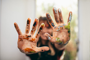 Artist showing her messy hands, an Arts & Entertainment Photo by Jacob Lund