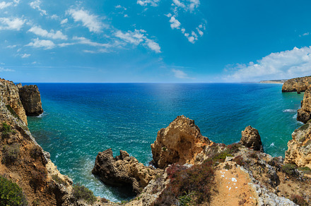 Atlantic ocean summer rocky coastline view (Ponta da Piedade, La, a Nature Photo by YuriyB