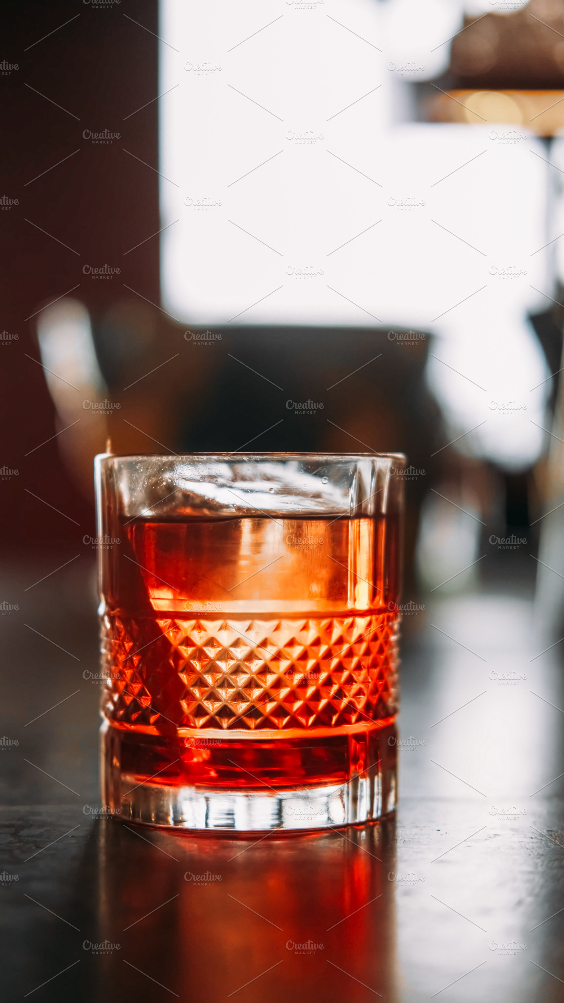 Refreshing beverage alcoholic cocktail glass cold, a Food & Drink Photo by Photo Drive Studio