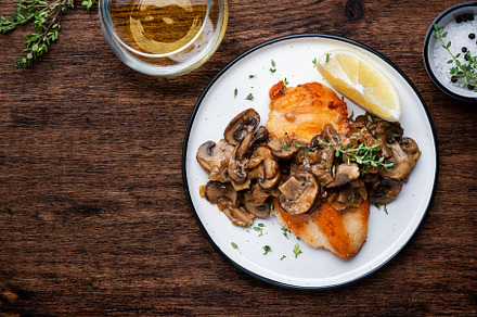 Fried chicken breast fillet with champignon mushrooms and onion, a Food & Drink Photo by 5PH