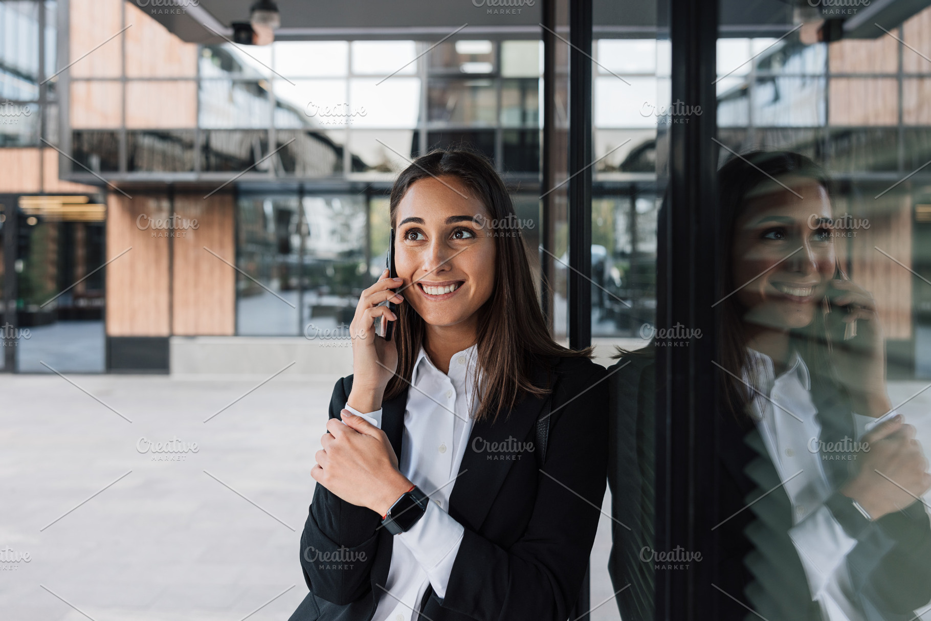 Smiling female in black formal wear, a Business Photo by Artem Varnitsin