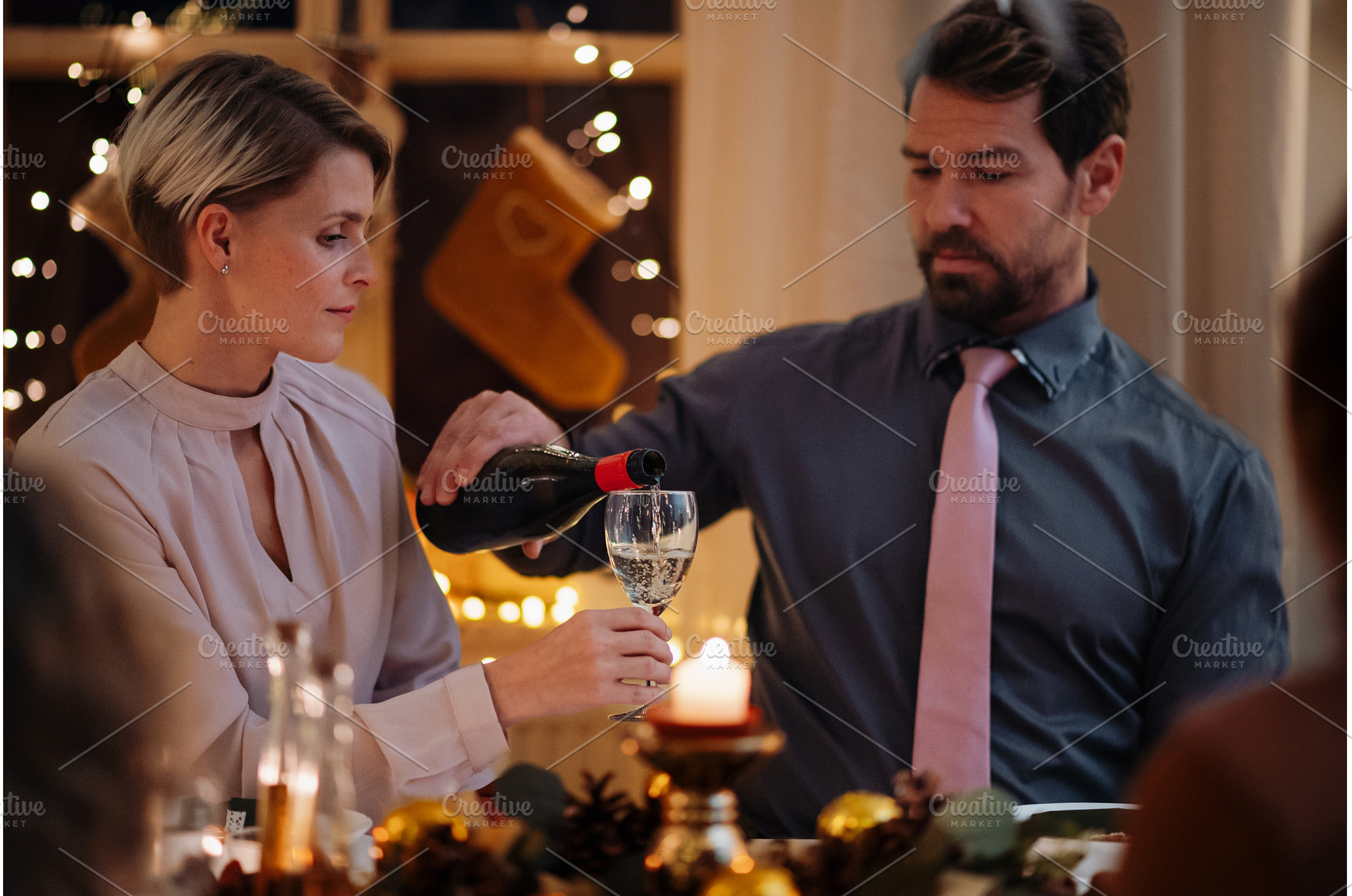 Christmas toast with white wine., a Person Photo by HalfPoint