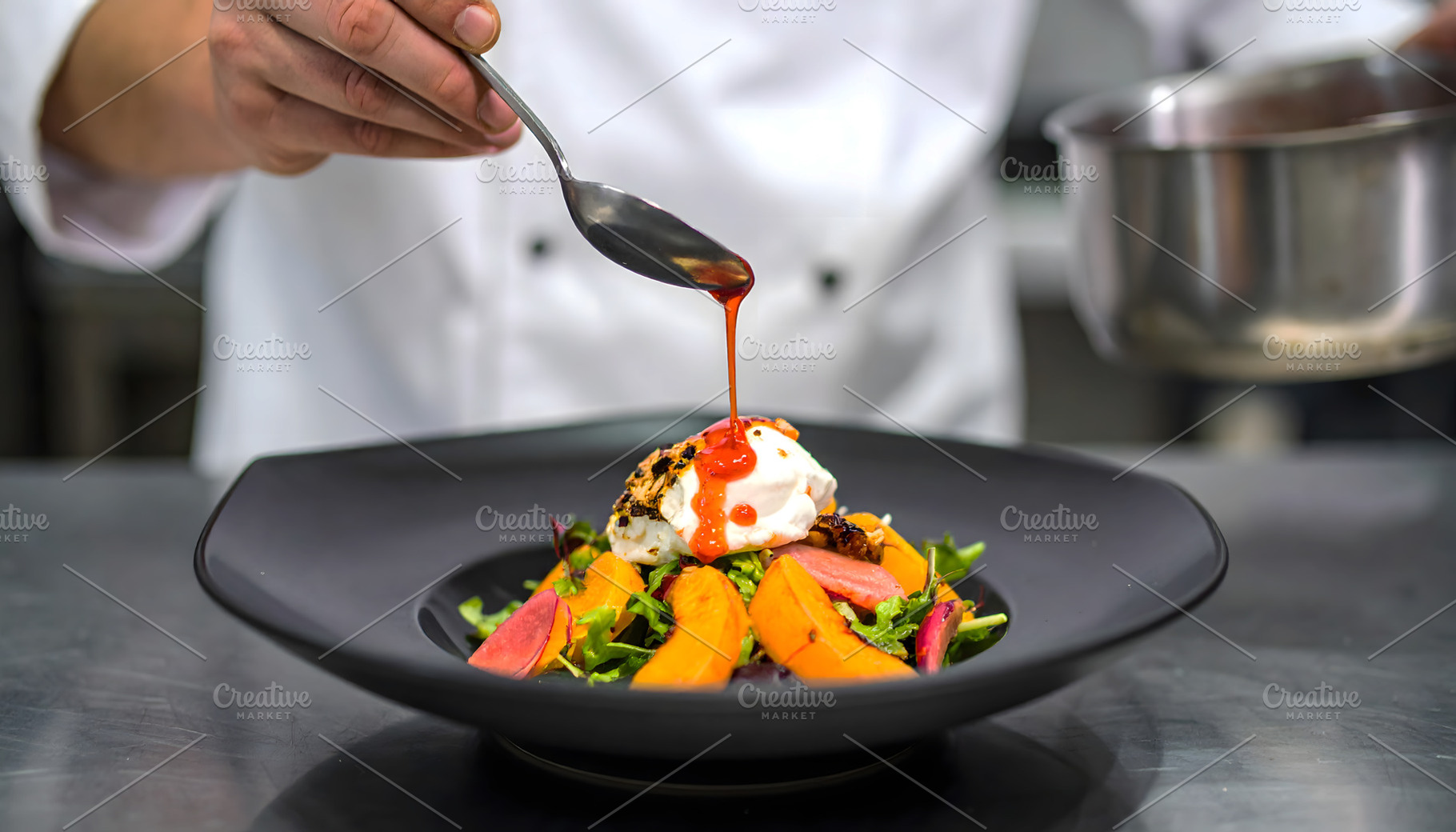 Chef Garnishing Salad with Poached, a Food & Drink Photo by Stock Shape