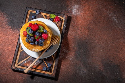 Stack of pancakes with berries, a Food & Drink Photo by Rimma