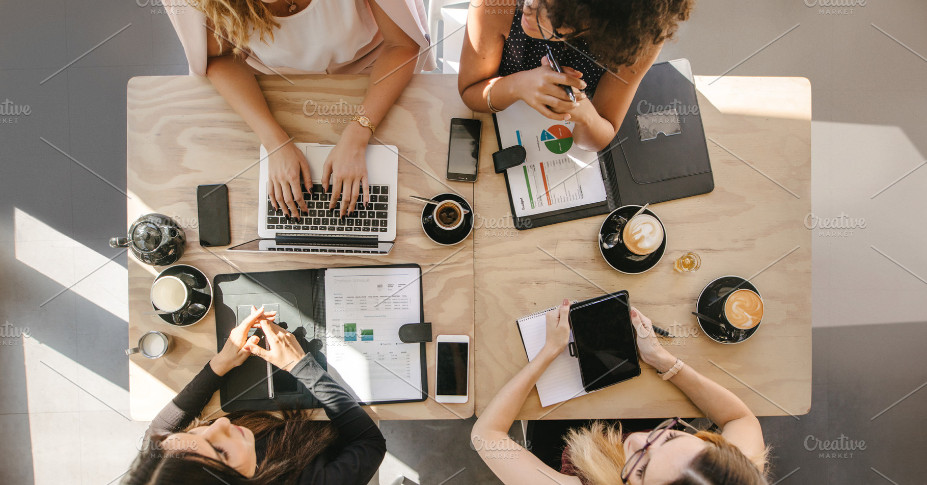 Group of women working together, a Business Photo by Jacob Lund