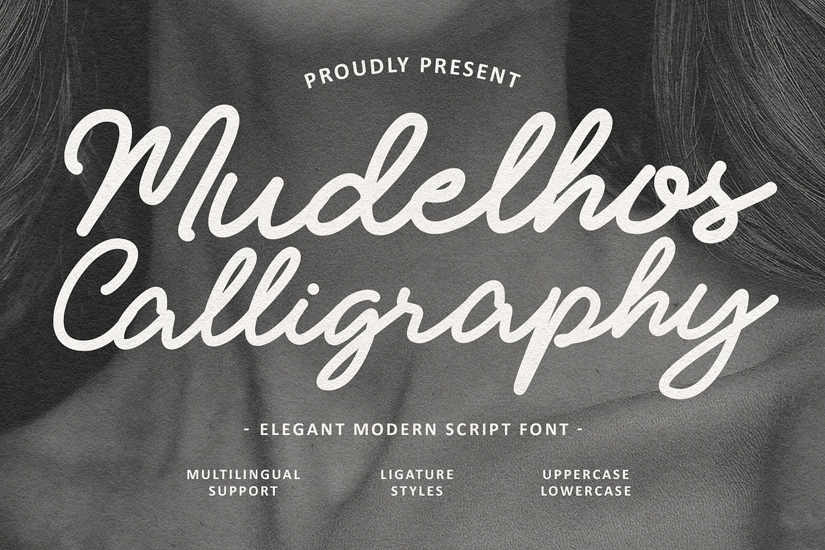 Mudelhos Calligraphy Script Font, a Script Font by Maulana Creative (Photo 1 of 7)