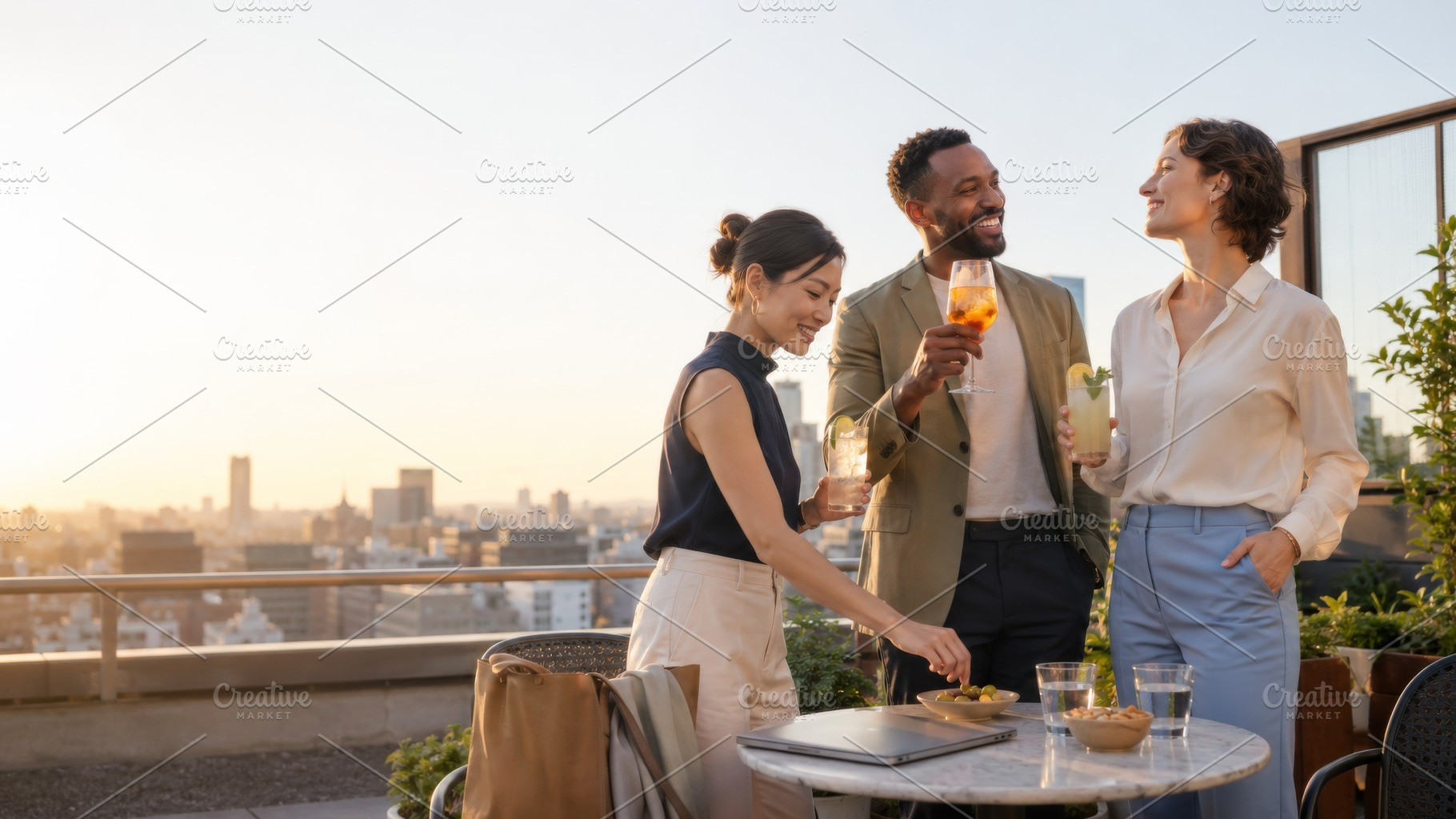 Group of adults enjoying rooftop dri, a Photo by Dvoevnore photos