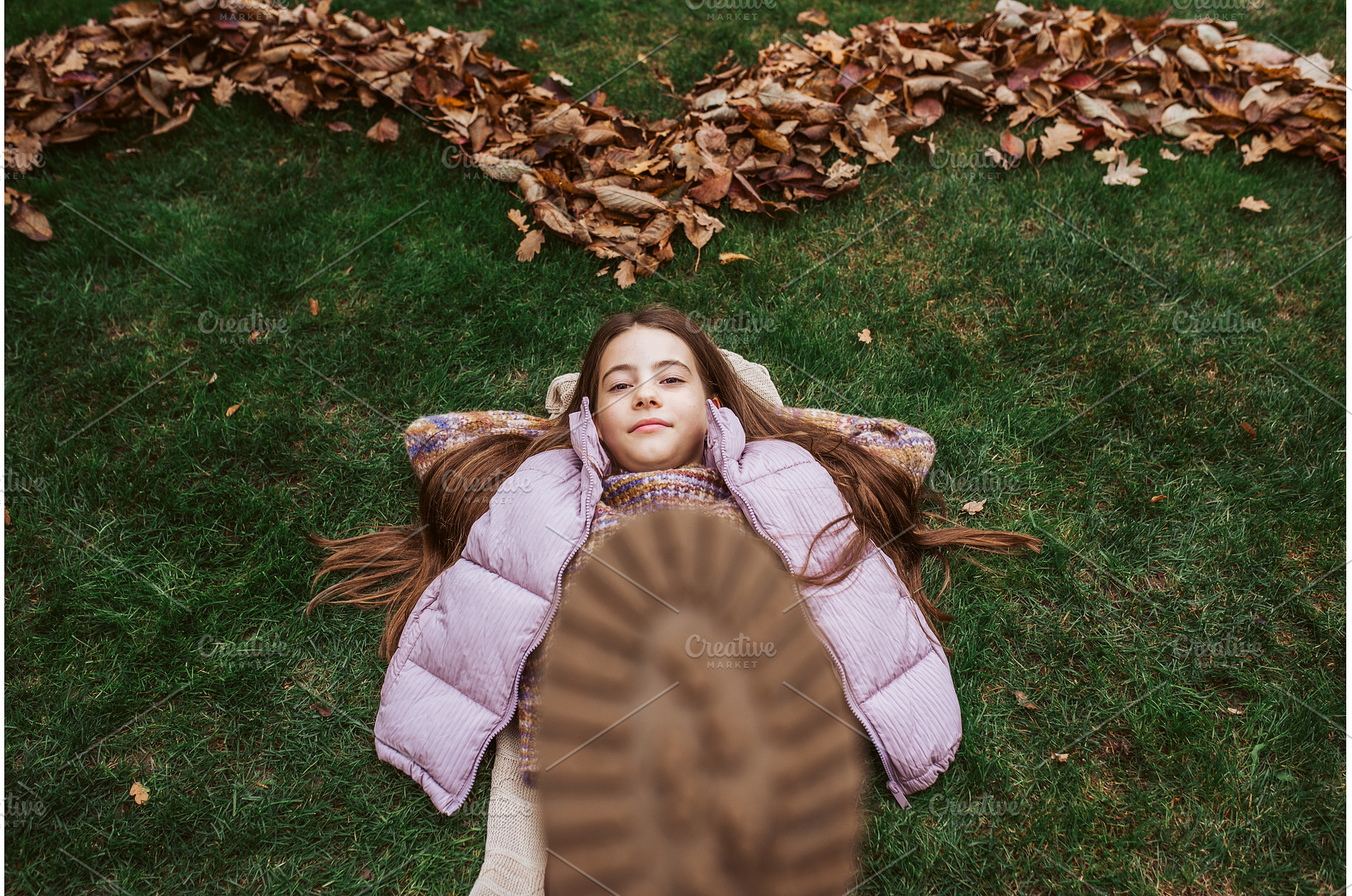 Portrait of teen girl laying on, a Person Photo by HalfPoint