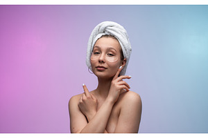 Young woman with a towel turban and, a Person Photo by volodymyrshtun13795