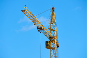 Construction crane stands tall, an Industrial Photo by darksoul72