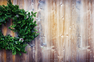 Christmas wreath featuring background, wreath, and rustic