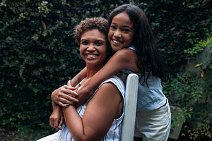 Smiling girl and her grandma, a Person Photo by Artem Varnitsin