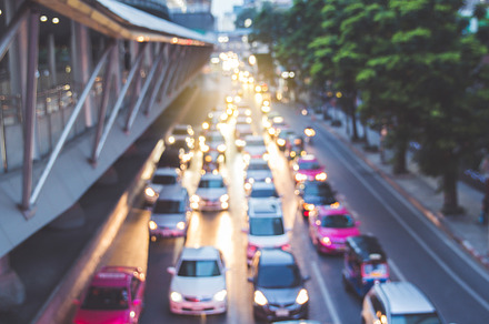 Defocused lights car in the road., a Transportation Photo by Nednapa