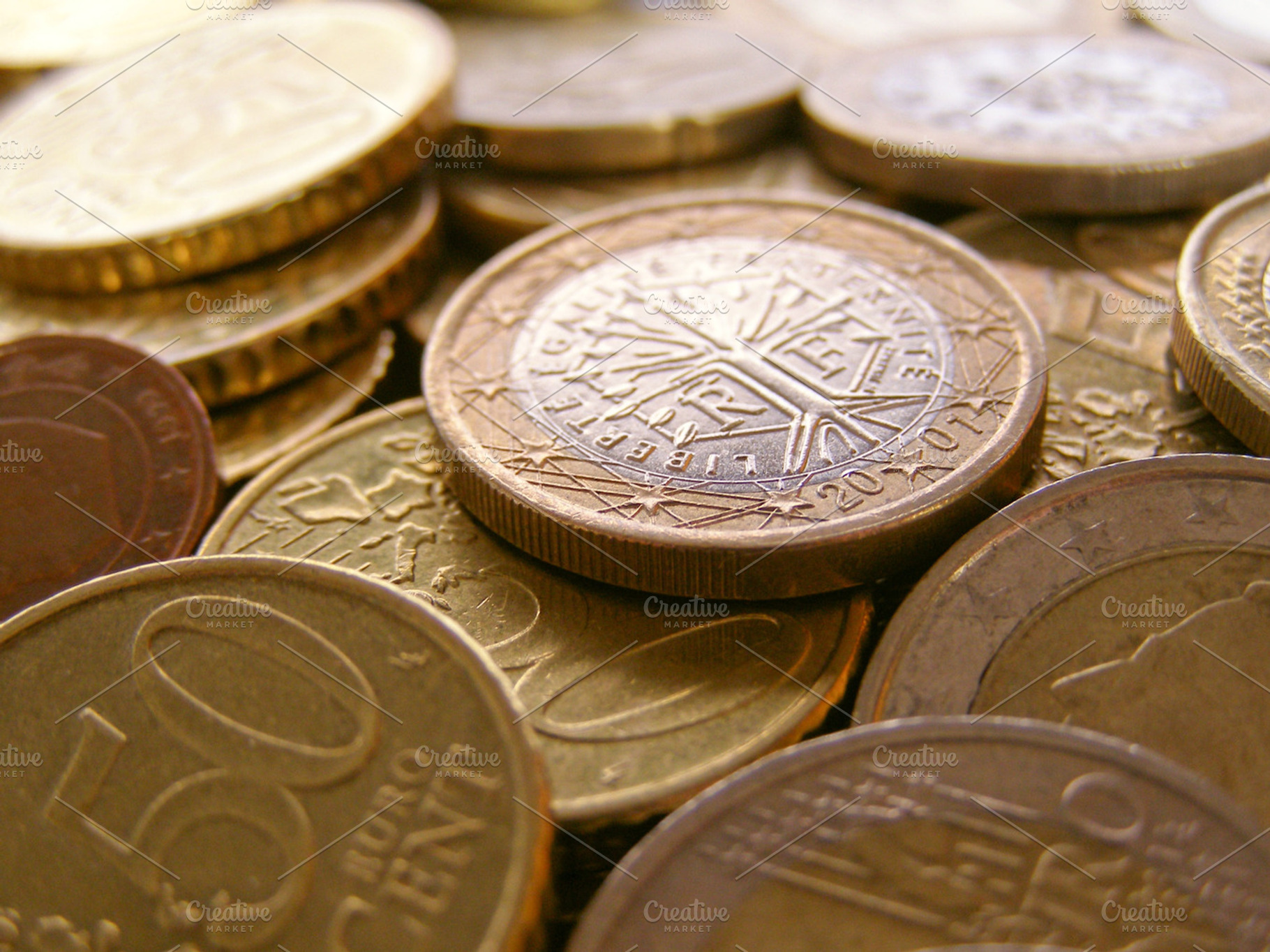 Euro coins containing euro, euros, and european union