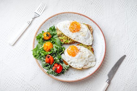 breakfast fried egg avocado toast, a Photo by Art Rachen